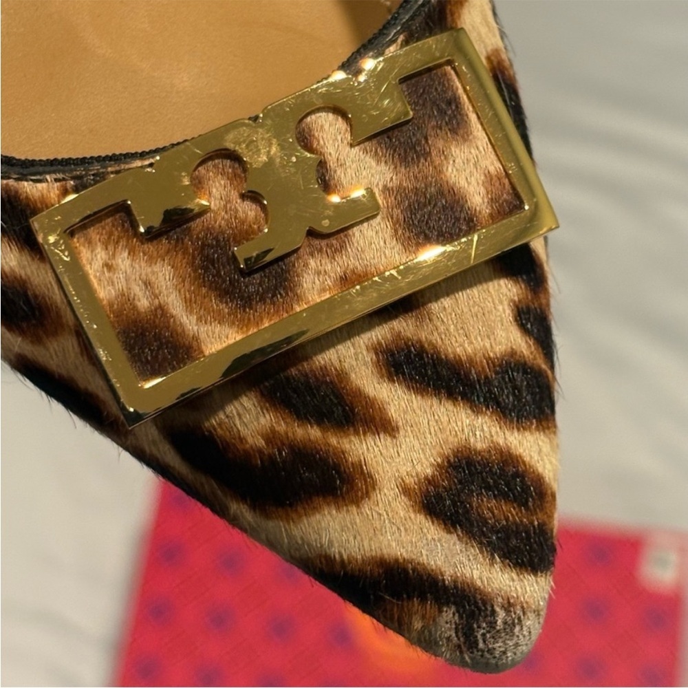 Tory Burch Animal Print Flats with Gold Accent - Picture 2 of 11